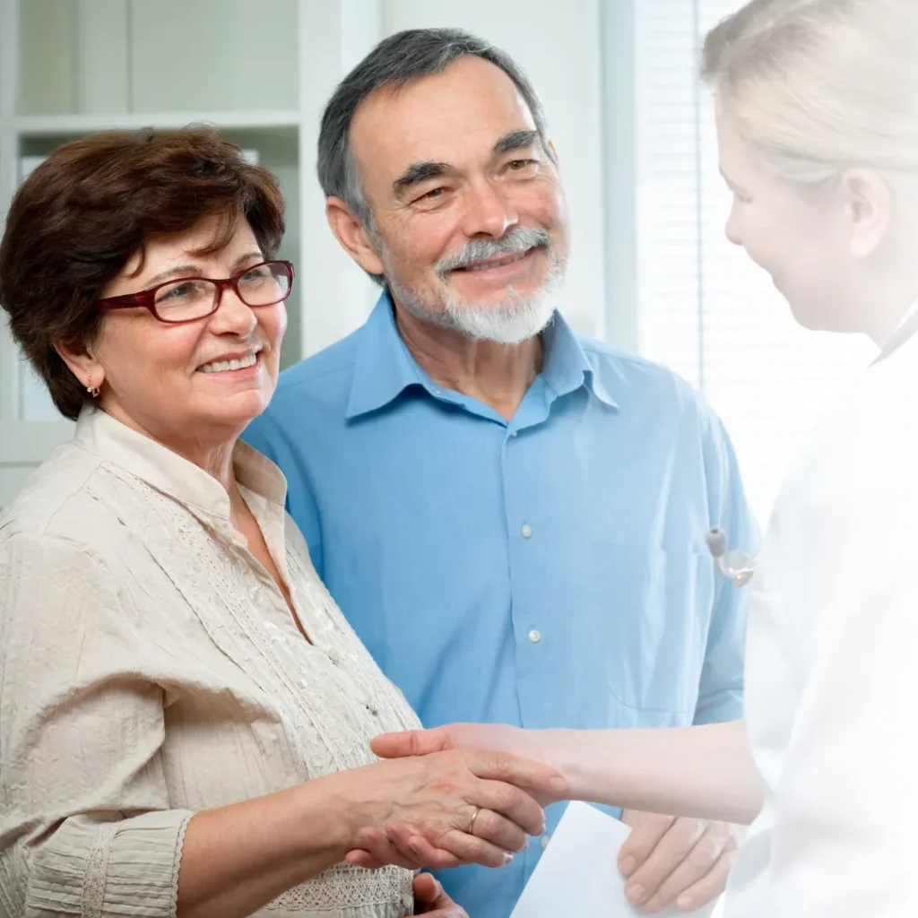 Doctor shaking hands with patients