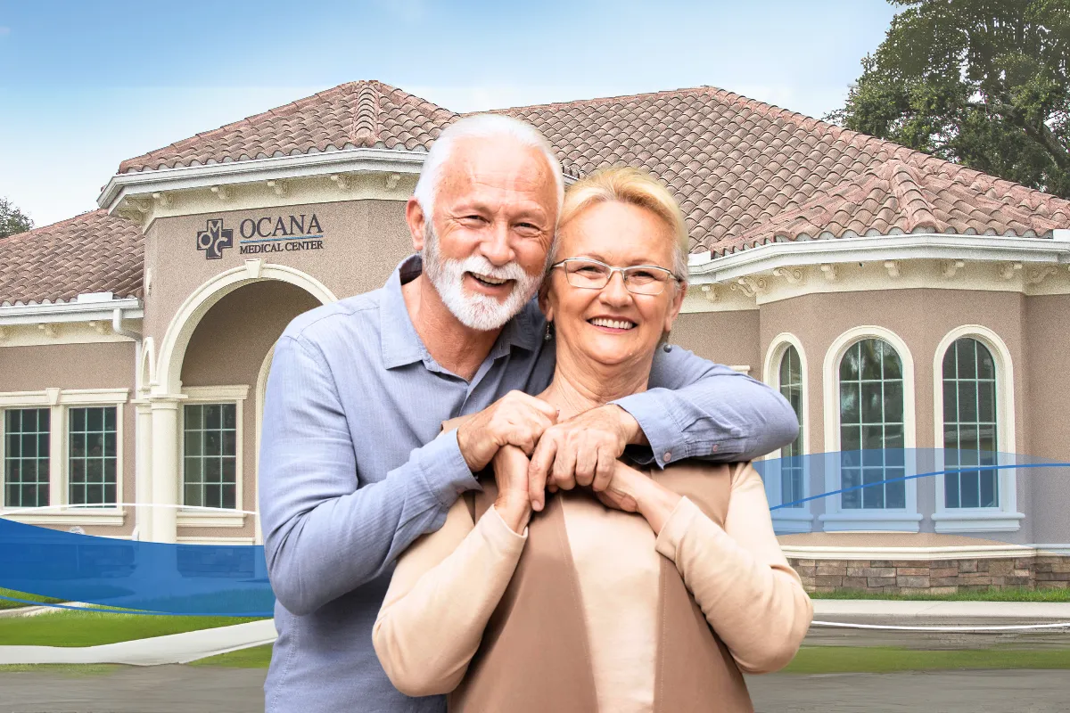 Older couples standing happy outside of Ocana Medical Center