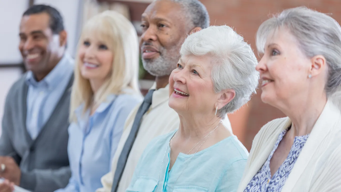 Seniors listening to a speaker
